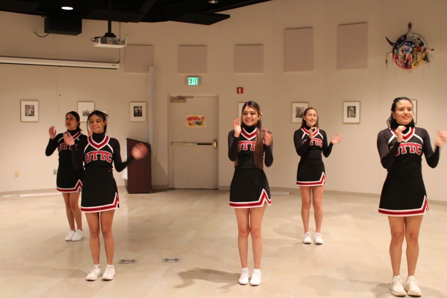 The UTTC Thunderbird Cheer Team wore their uniforms for the first time during practice on Nov. 5. Pictured are five of the six team members: Jada Kuntz, Abrielle Weasel, Hailey Eagleman, Dominique Miner and Selena Silk. Not pictured is Valerie Janis. (Photo credit/ Adrianna Adame)