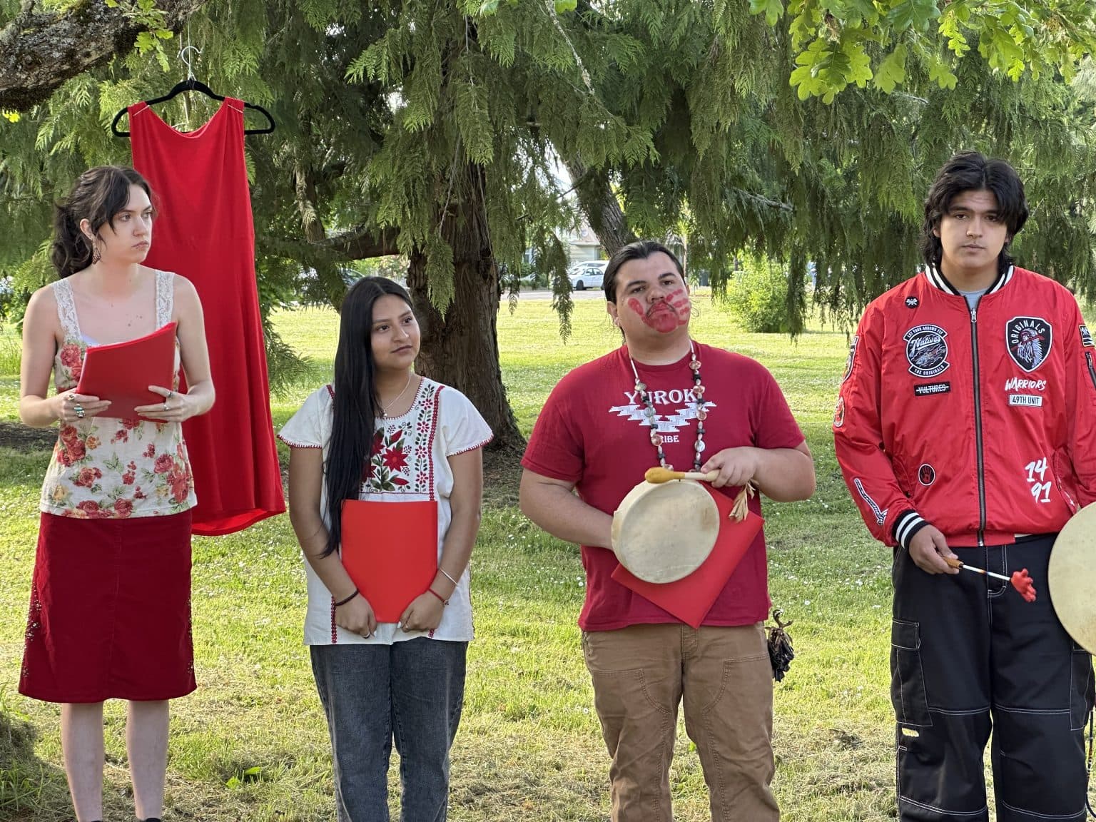 Isla Montgomery, Ninel Bautista Sanchez, Pachomio Feliz and Te'e Phillips Brown were among more than a dozen organizers and Native students from the University of Oregon who recited poems by Indigenous people at the fifth annual Poetry in the Park event, May 7, 2025.