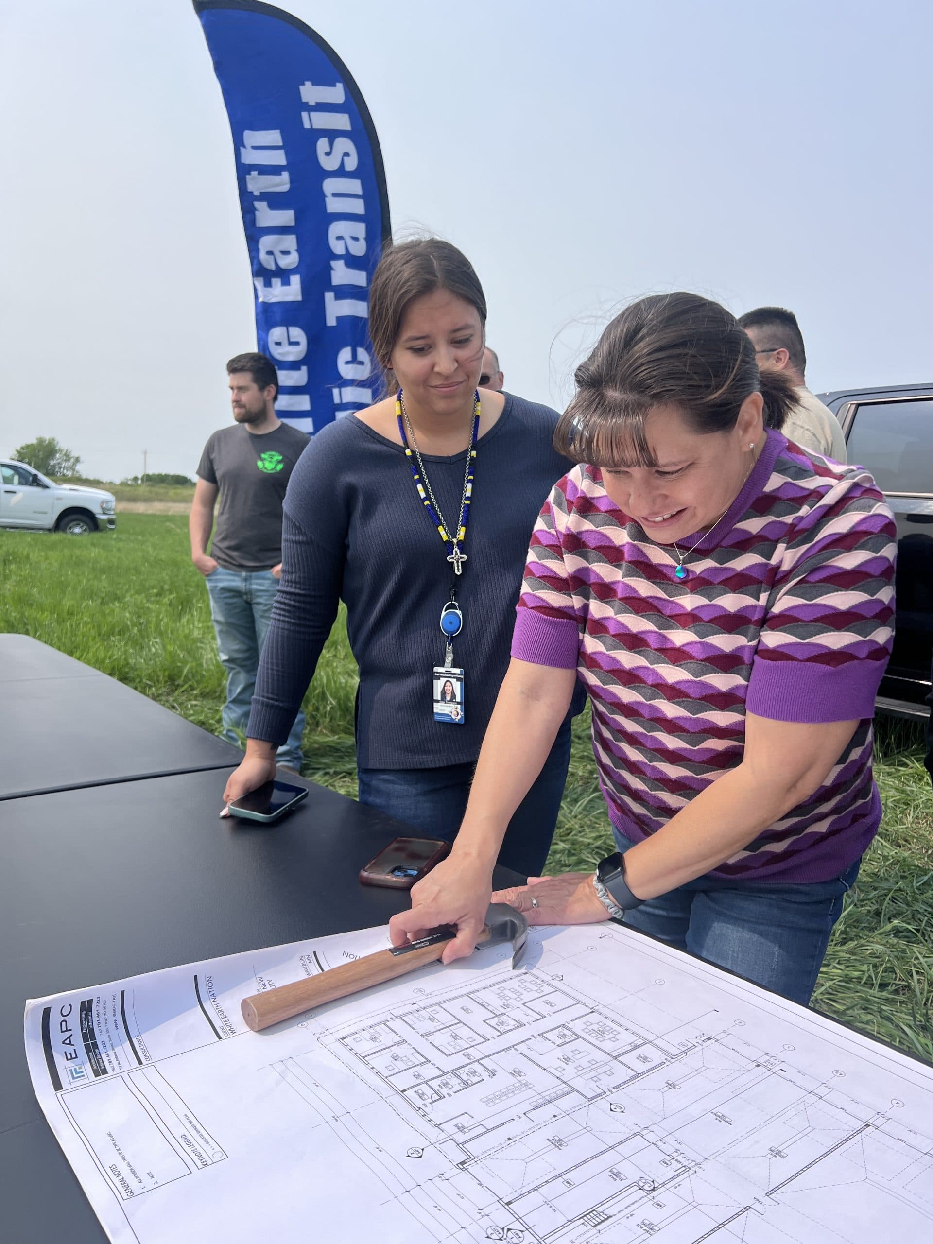Rep. Laura Lee Erickson, White Earth Nation District 3 leader, looks at architectural designs on Friday, May 30, 2025 during the groundbreaking for tribe’s transit station.
