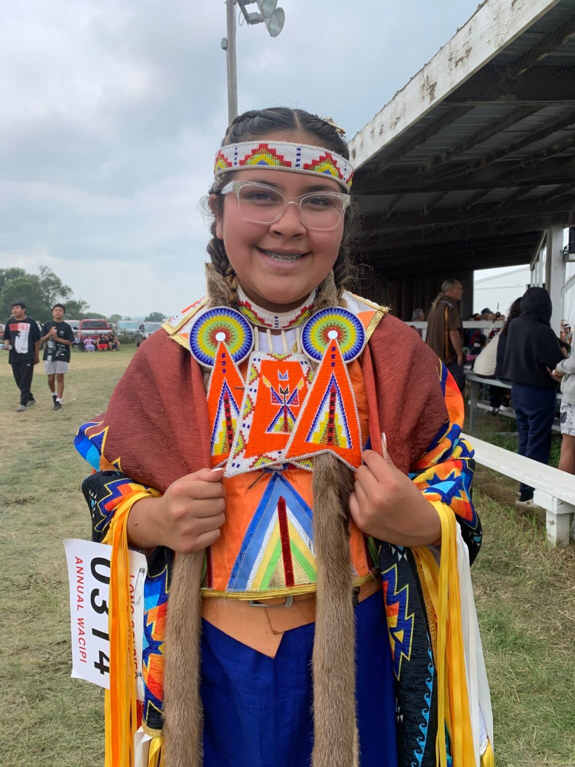 At just 12 years old, Madison Crow Feather won fourth place in the Aug. 1 Red Dress Special. She has been dancing for nearly 10 years. (Photo credit: Jolan Kruse) 