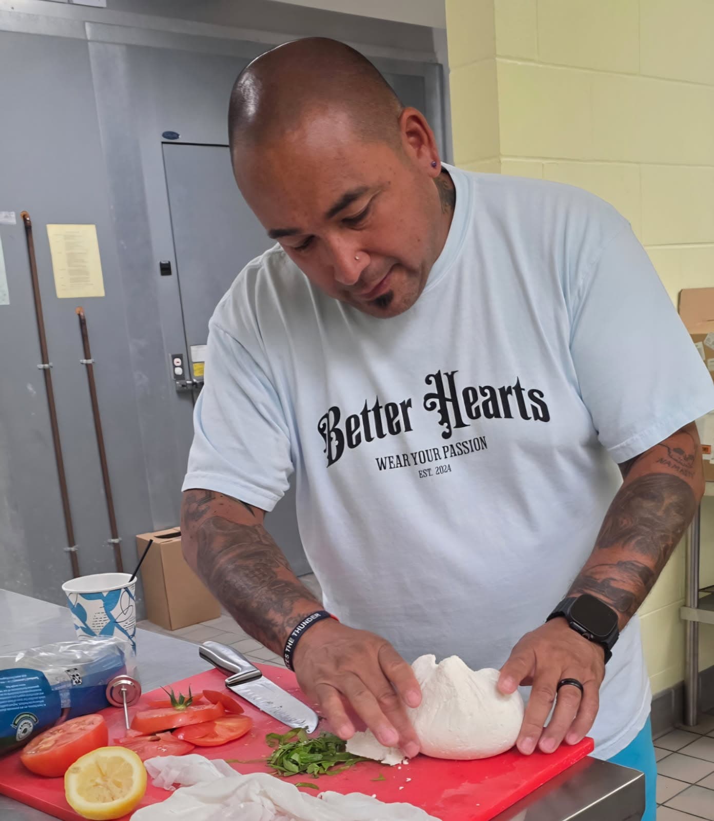 Juan De La Cruz shapes a ball of fresh mozzarella while teaching a cooking class, Nueta Hidatsa Sahnish College kitchen, New Town, North Dakota, Wednesday, July 9, 2025. (Photo by Sonya Abe)
