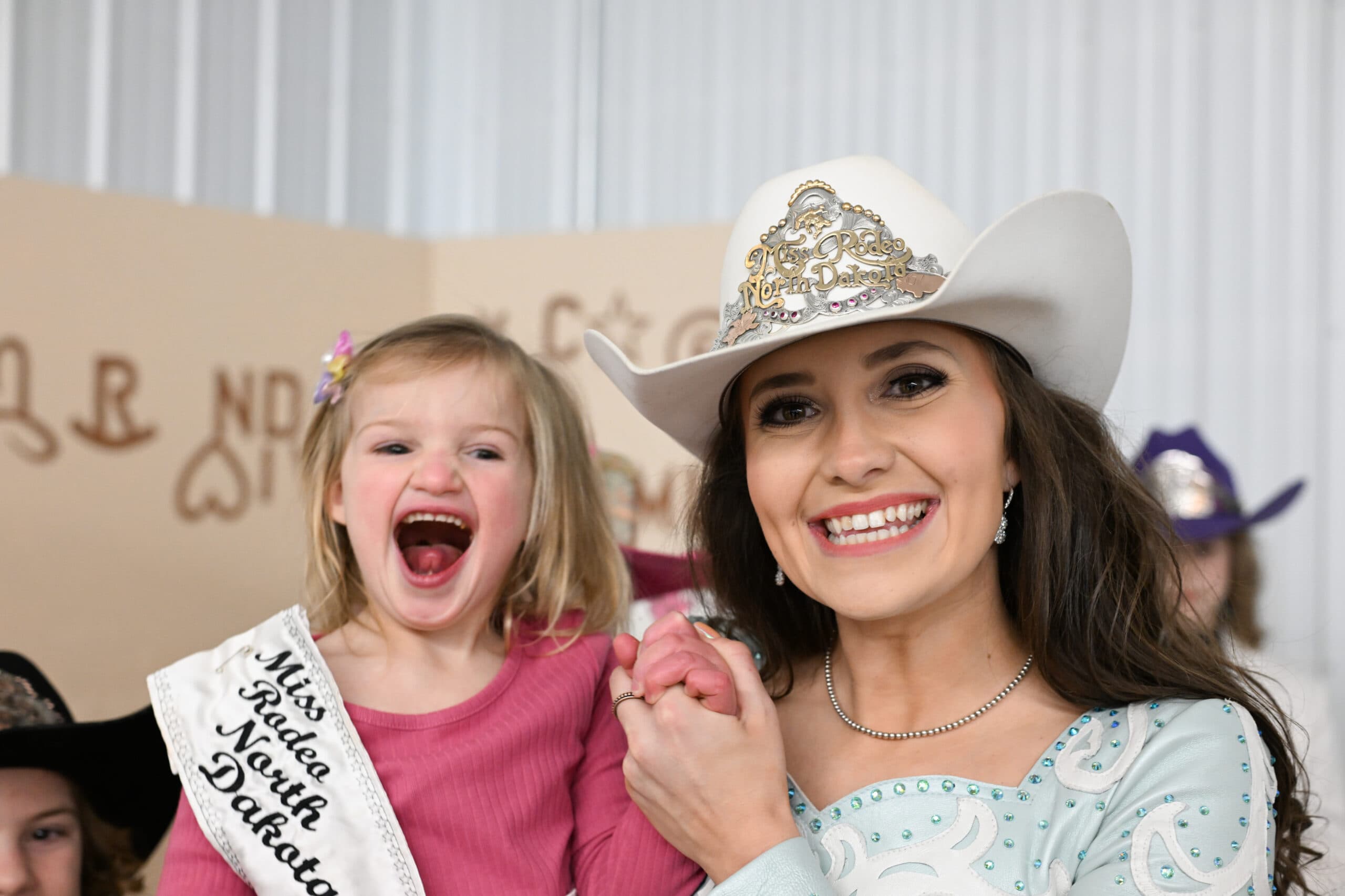 Hicks poses with her niece, Kyler (Sissy), at the Miss Rodeo North Dakota coronation party.