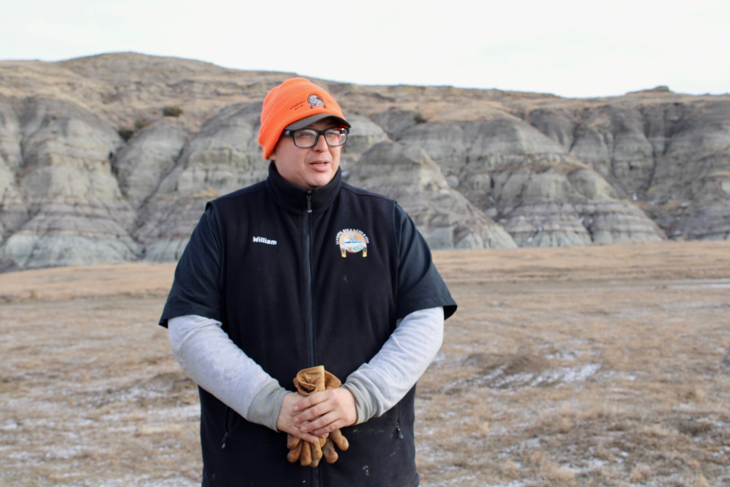 William Thompson, Standing Rock Sioux Tribe’s buffalo herd ranger, watches a group of buffalo at the tribe’s largest pasture, Selfridge, North Dakota, Friday, Jan. 9, 2026. (Gabrielle Nelson/Buffalo’s Fire)