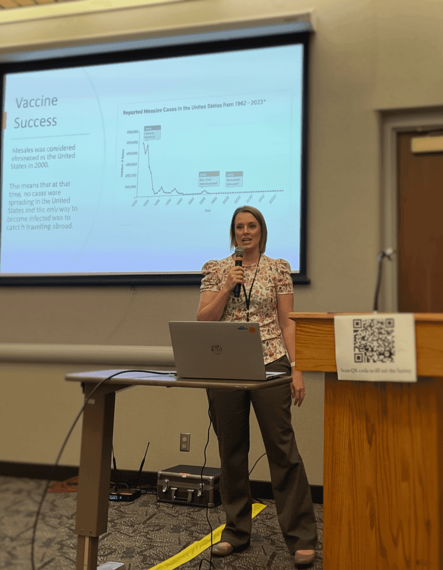 Great Plains Tribal Leaders Health Board lead epidemiologist Sarah Shewbrooks speaks to UTTC Tribal Leaders Summit attendees about measles and the importance of getting vaccinated, Bismarck, North Dakota, Sept. 4, 2025. (Buffalo’s Fire Photo/Gabrielle Nelson)