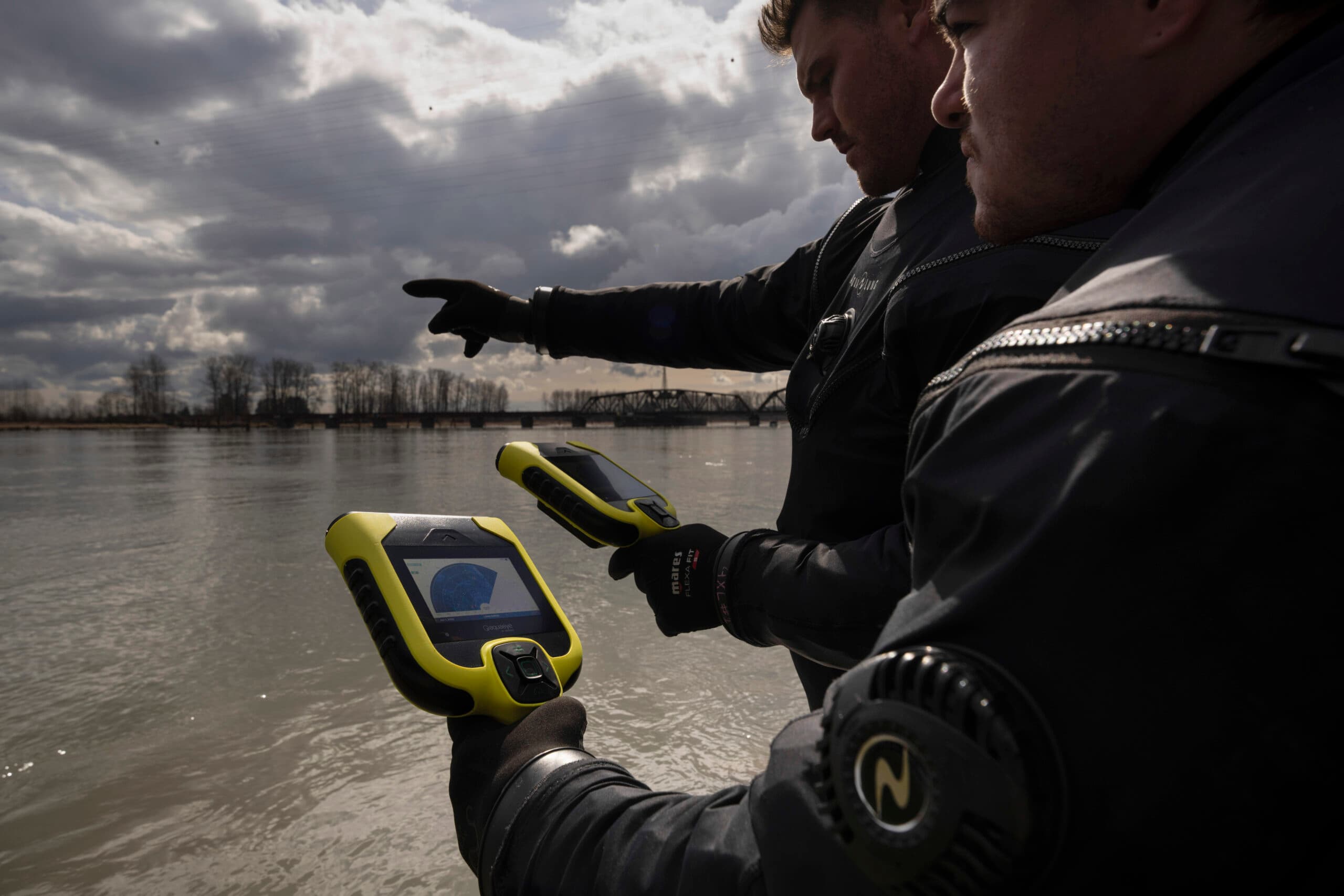 In a photo issued in a media press kit, an AquaEye device is shown being used by searchers in a body of water.
