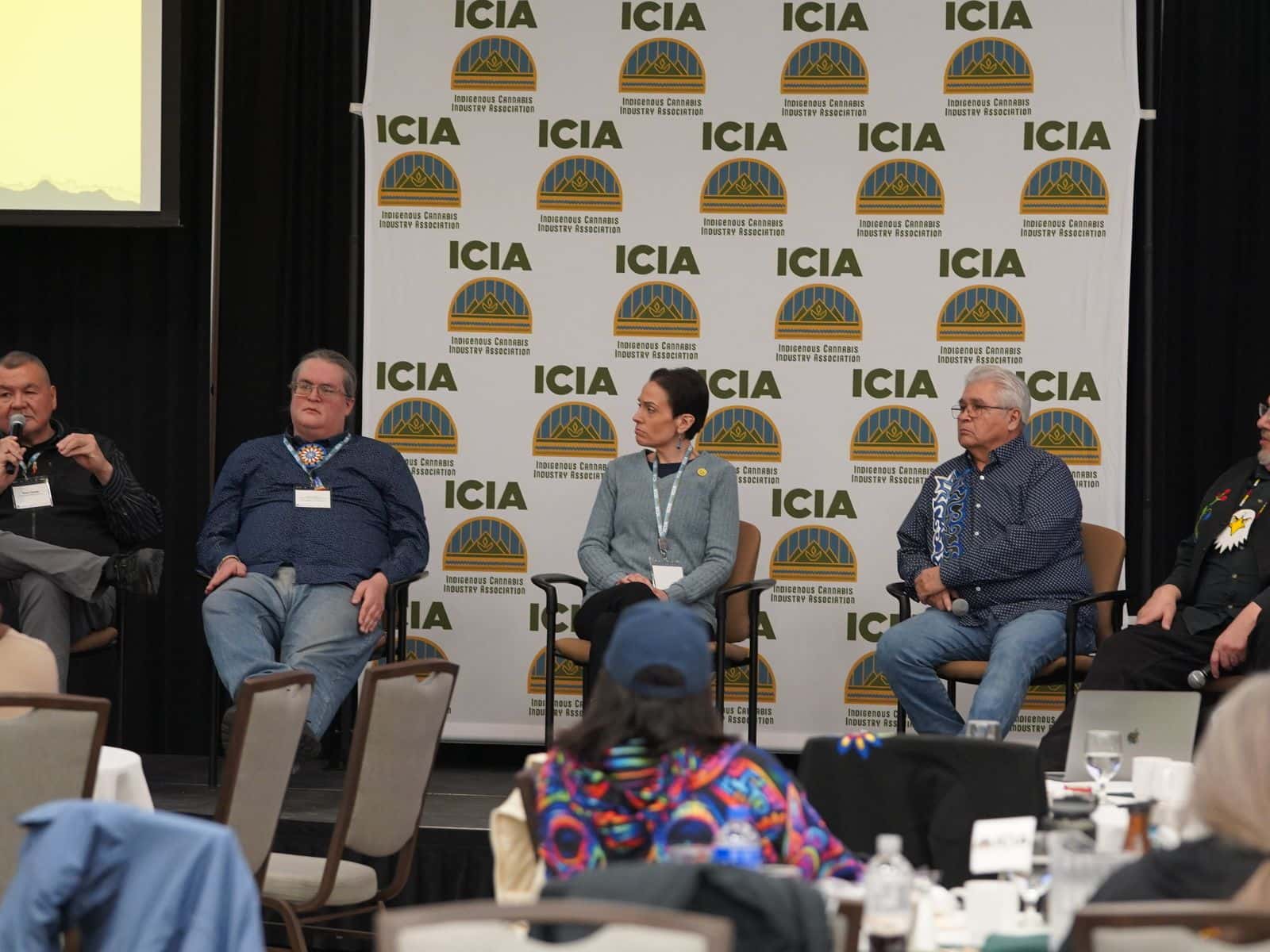 Tribal leaders sit on a panel at the 4th annual Great Lakes Cannabis & Hemp Conference in Lac du Flambeau, Wisconsin. From left to right: White Earth Ojibwe Chairman Mike Fairbanks, Menominee Nation of Wisconsin Councilman Marcus Grignon, Red Cliff Band of Lake Superior Chairwoman Nicole Boyd, Sakoagon Chippewa Chairman Robert Van Zile, and Lac du Flambeau Band of Lake Superior Chippewa Indians President John Johnson.