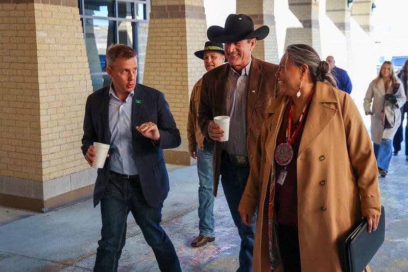 North Dakota Gov. Kelly Armstrong, South Dakota Gov. Larry Rhoden and Standing Rock Chairwoman Janet Alkire converse during a meeting April 7, 2025, in Fort Yates.