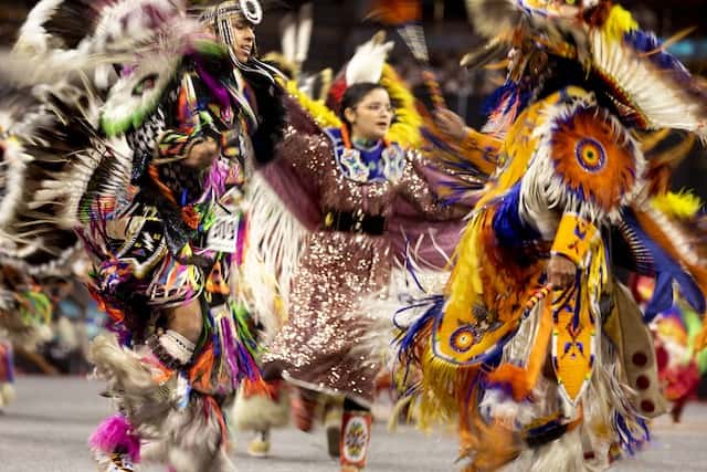 A fancy dance kicks off programming for the Denver March Powwow at the Denver Coliseum. March 18, 2022.
