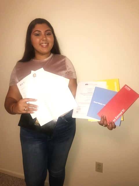 Elizabeth Silver with nine acceptance letters from multiple universities