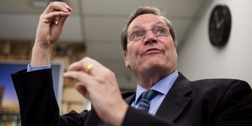 Ford Gilbert, founder and CEO of Trina Health, is shown in an office at the company’s Sacramento headquarters on Feb. 5, 2018. He is flipping through a PowerPoint presentation he uses to explain to investors the effects of the Trina IV insulin infusion procedure. (Megan Wood/inewsource)