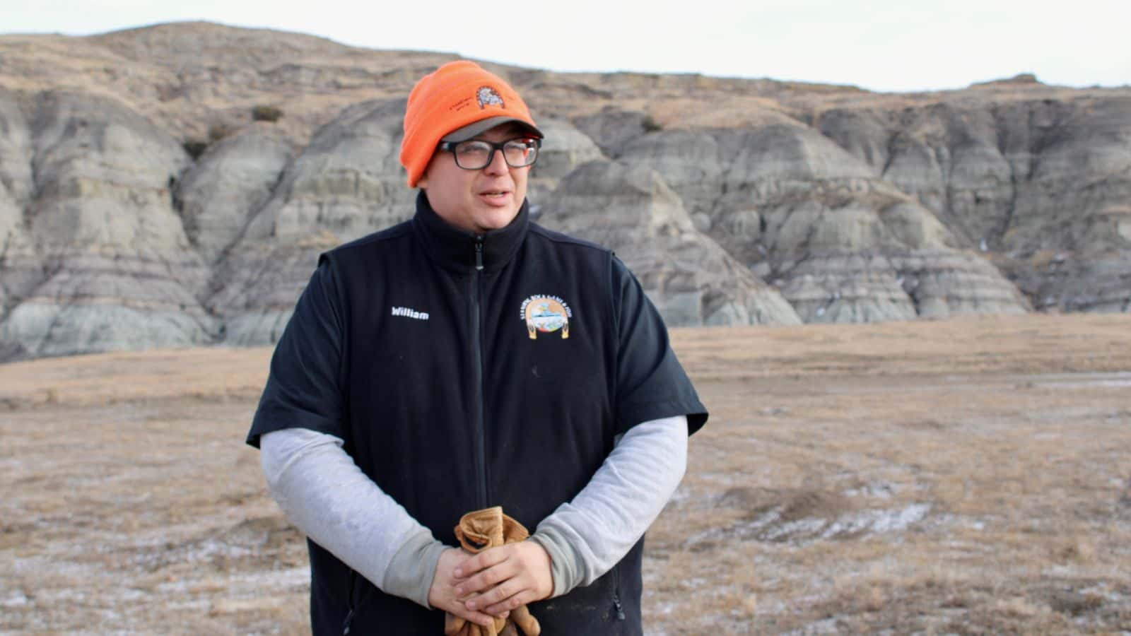 William Thompson, Standing Rock Sioux Tribe’s buffalo herd ranger, watches a group of buffalo at the tribe’s largest pasture, Selfridge, North Dakota, Friday, Jan. 9, 2026. (Gabrielle Nelson/Buffalo’s Fire)