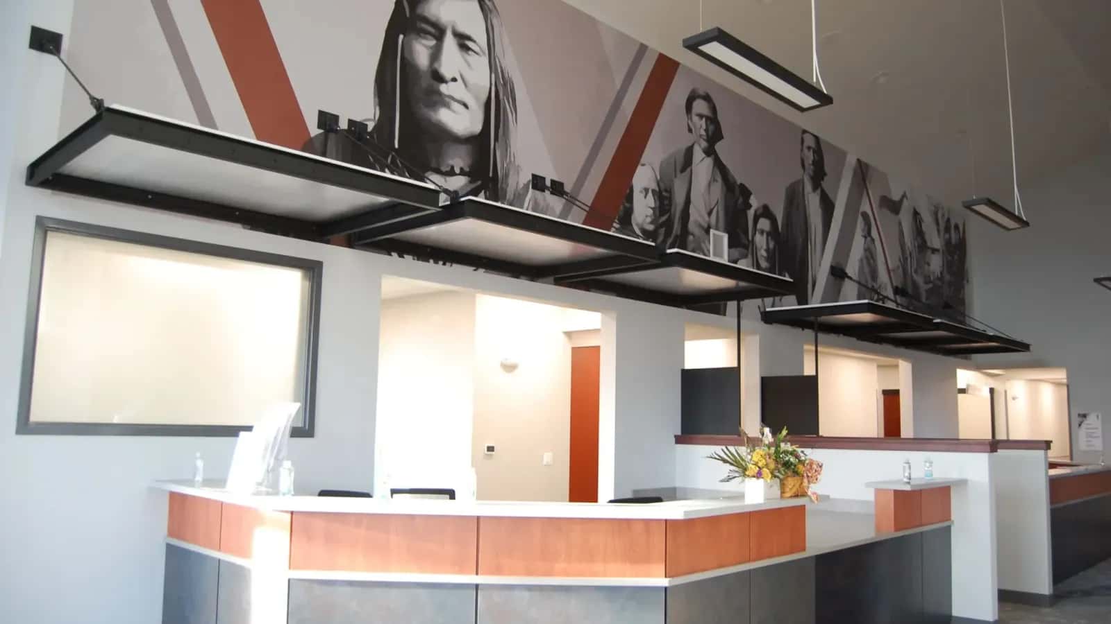An image of Ayabe-Way-We-Tung, the chief of the Little Shell Tribe of Chippewa Indians, who began pushing the U.S. government for a reservation in the 1870s, adorns the wall in the Little Shell Tribal Health Clinic lobby in Great Falls, Montana. The mural is a reminder of the tribal nation's long push for federal recognition, which was granted in December 2019. Credit: Katheryn Houghton / KHN