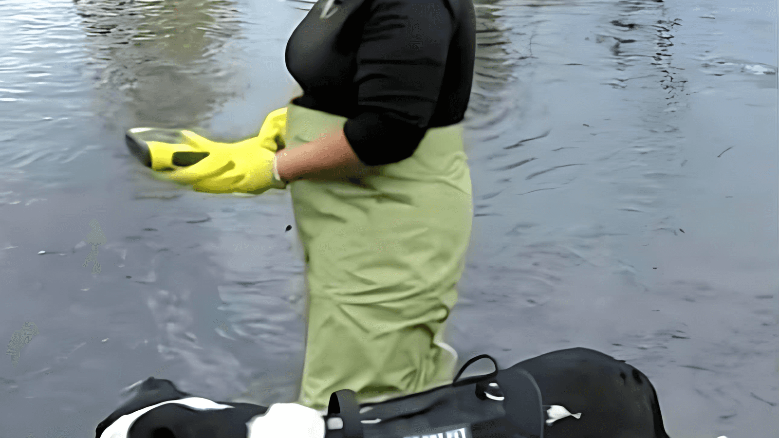 Kimberly Lining, of MMIW Search and Hope Alliance, takes the AquaEye Pro out onto the Umatilla River, accompanied by her dog, Picklesworth on Sunday, Nov. 2, 2025. Lining says she’s training her dog to be a scent/cadaver dog.