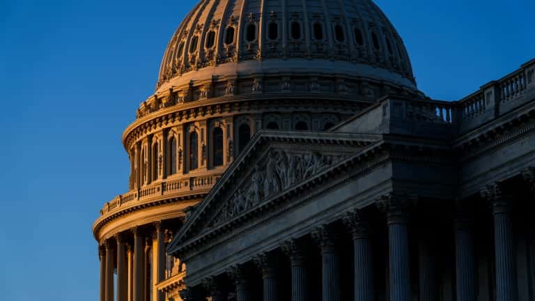 The rising sun illuminates the U.S. Capitol in this file photo from Dec. 19, 2022, in Washington, D.C. (AP Photo/Matt Rourke, File)