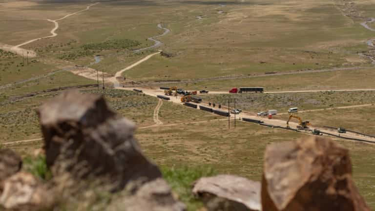 Downhill from Peez’uh, also known as Nipple Rock or Sentinel Butte, Lithium Nevada workers continue constructing a water pipeline that would pump 1.7 billion gallons of water each year for the next 40 years. Photo by Jarrette Werk (Underscore News / Report for America)
