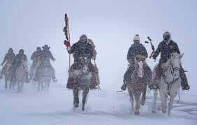 The Dakota 38+2 horseback riders battle sub-zero temperatures and snowfall on the way to their stop in Redwood Falls, Minn., Dec. 21, 2022. (Photo courtesy of Casey Ek)