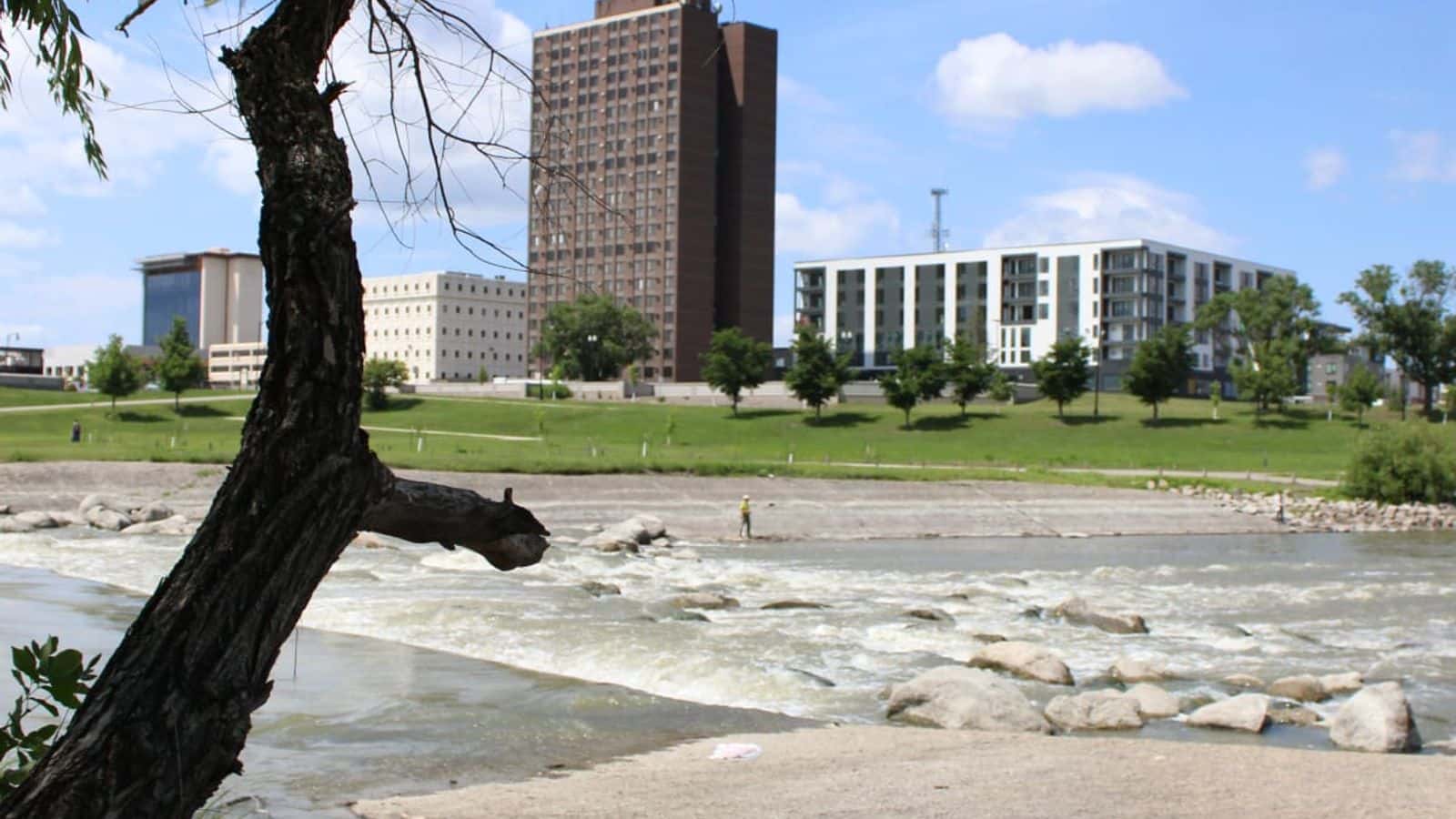Downtown Fargo, North Dakota, is seen from the Moorhead, Minnesota, side of the Red River on July 8, 2023. Red River Women’s Clinic moved to Moorhead from Fargo after the Supreme Court ended federal protections of abortion. (Morgan Fischer, News21)