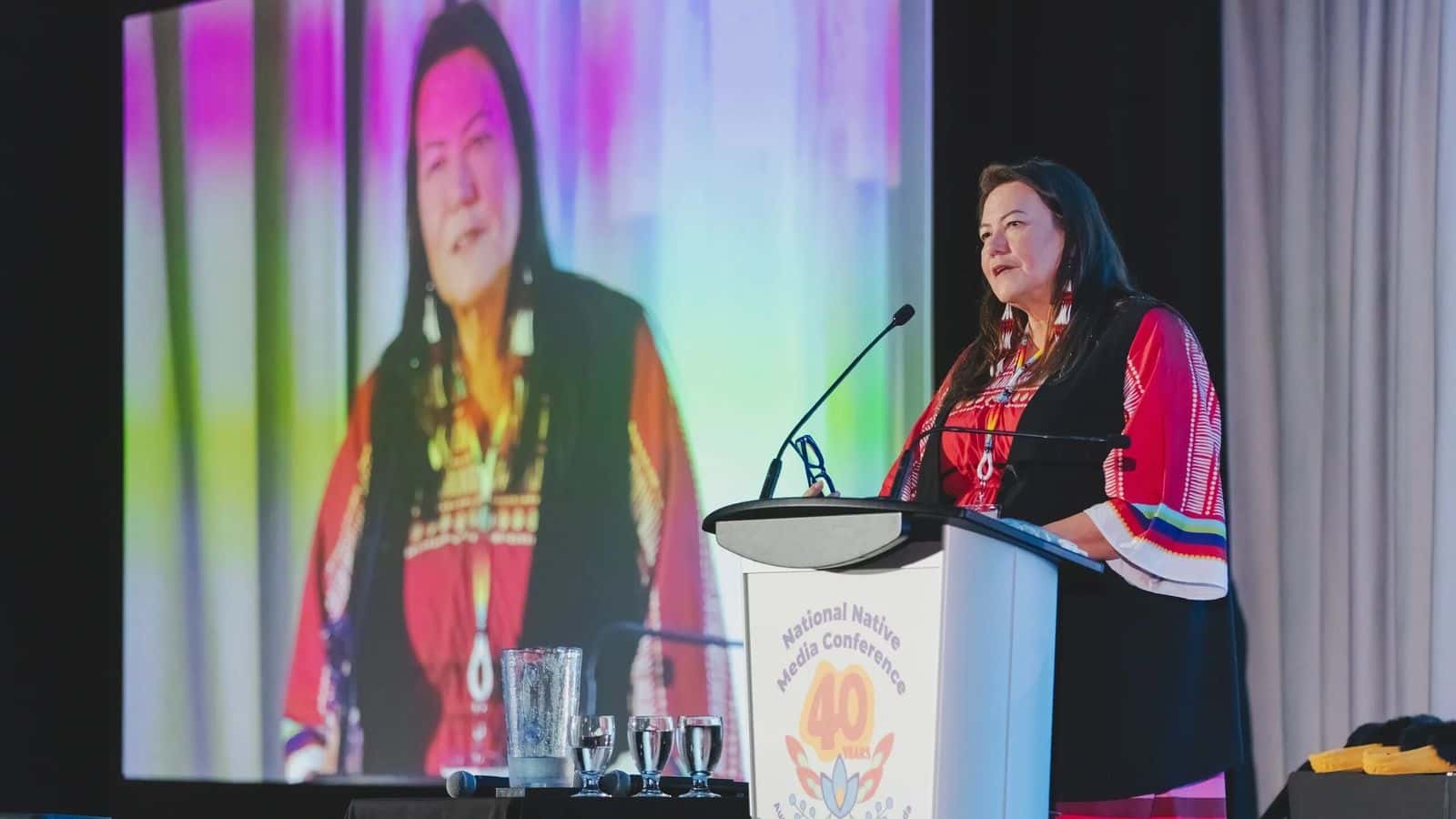 Jodi Rave Spotted Bear gives acceptance speech for the Tim Giago Free Press Award at the National Native Media Conference in Winnipeg on Aug. 12, 2023. (Photo credit/ Jodi Rave Spotted Bear)