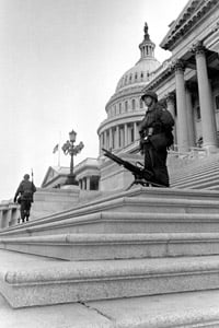 U.S. troops stand guard on the steps of the Senate wing of the Capitol Building in Washington, D.C., on April 5, 1968. Armed National Guardsmen were again called in a few days later as Congress passed Title VIII of the 1968 Civil Rights Act, commonly known as the Fair Housing Act. (AP Photo)