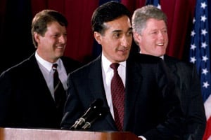 Henry Cisneros, the former mayor of San Antonio, Texas, acknowledges his family on Dec. 17, 1992, after being appointed secretary of Housing and Urban Development by President-elect Bill Clinton. In his confirmation hearing, Cisneros told senators that if he became HUD secretary, the agency's passivity on integration would end. (Chris Wilkins/AFP/Getty Images)