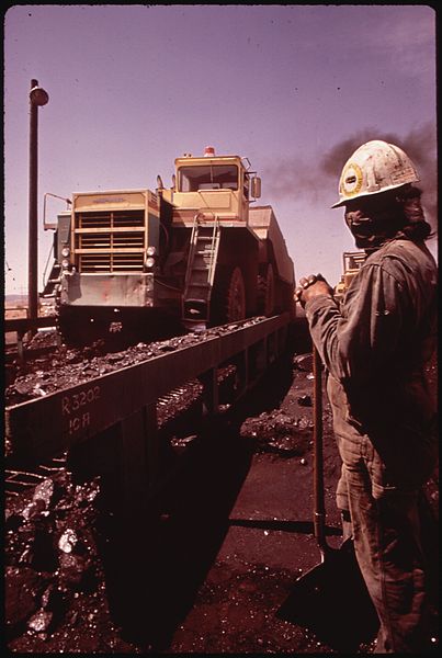 COAL HAULERS AND NAVAJO WORKMAN AT THE PEABODY COAL COMPANY sepia color
