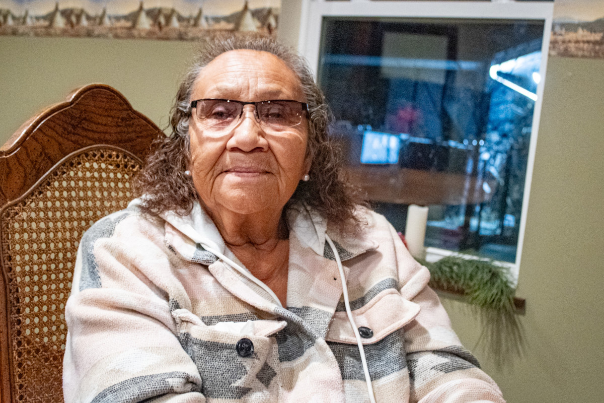 Genevive Chase In Sight-Ribitsch, 71, is the descendant of a survivor of the Wounded Knee Massacre in 1890. Chase In Sight-Ribitsch is an active member of the Si’Tanka Ta’ Oyate O’mniceye (Descendants of the Chief Spotted Elk Nation) group.  (Photo by Amelia Schafer, ICT/Rapid City Journal)