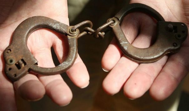 Photo of tiny handcuffs at Haskell by Mary Annette Pember.