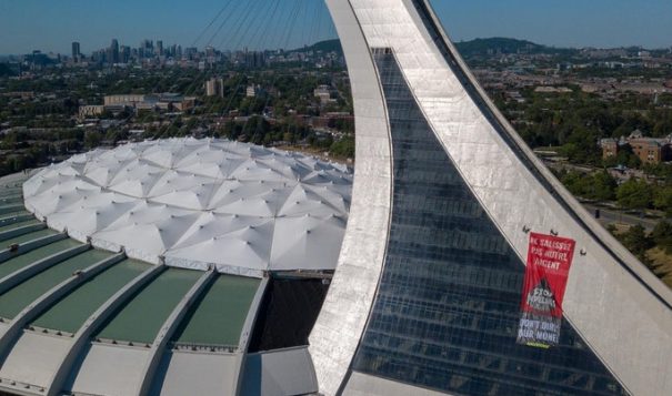 Greenpeace activists scale Olympic Stadium Tower against Trans Mountain pipeline