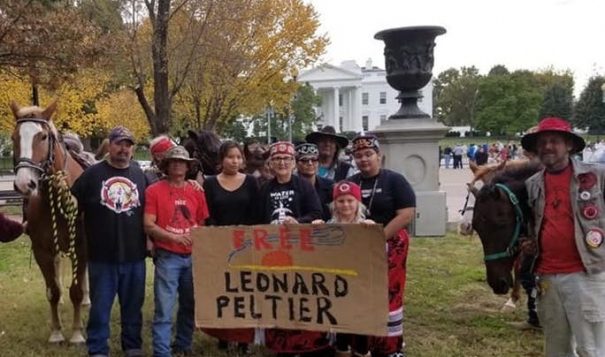 The Leonard Peltier Freedom Riders and their allies deliver a message to President Trump to free Leonard Peltier.(Photo by Frank Hopper.)