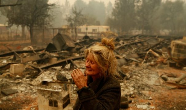 Vulnerable populations such as the elderly face heightened barriers to recovery when fire devastation hits. Paradise, California, resident Cathy Fallon reacts as she stands near the charred remains of her home.
John Locher/AP Images