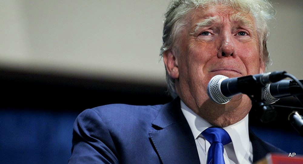 white man donald trump looking sad in front of a microphone
