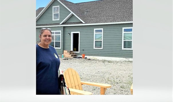 School board member Edith Wagner visits a new modular home, part of the Feather Woman Healing Lodge on Heart Butte School District’s K-12 campus. 