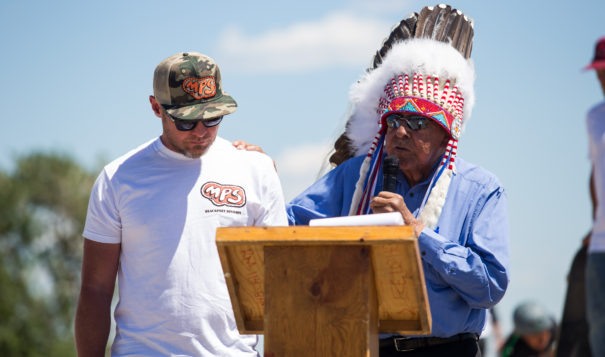 Blackfeet Nation Chief, Earl Old Person, gives Pearl Jam bassist and Big Sandy native, Jeff Ament, a traditional Blackfeet name for his contribution of a skate park to the community of Browning on June 25, 2015.