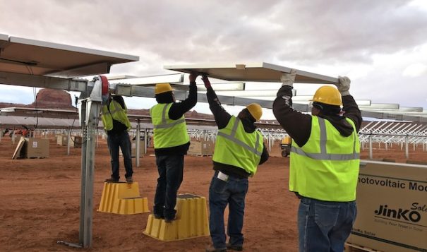 The construction project to build the Kayenta solar farms on the Navajo Nation, shown here in 2018, employed hundreds of people, nearly 90 percent of whom were Navajo citizens. Renewable energy is drawing increasing attention from tribes and others as a way to build jobs for the future. (Photo courtesy of the Navajo Tribal Utility Authority/Navajo Nation)