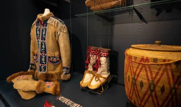 Athabascan objects, including a chief's coat from the Tanacross area, are displayed at the Alaska Native Heritage Center on Friday, April 22, 2022. The objects are some of 1,744 items that were donated to the center by Wells Fargo. (Loren Holmes / ADN)

Anchorage Daily News