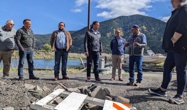 U.S. Department of the Interior Assistant Secretary for Indian Affairs Bryan Newland, center, listens to an employee of the Columbia River Inter-Tribal Fish Commission at the Cooks Landing in-lieu site along the Columbia River on May 3. Photo by Chris Aadland/Underscore.news and Indian Country Today

Underscore.news