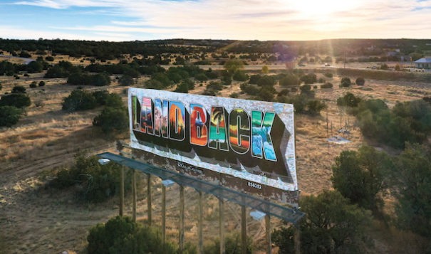 A billboard designed by artist Votan Henriquez was installed in Edgewood, New Mexico, as part of@landback.art.

Roberto E. Rosales/@landback.art
 