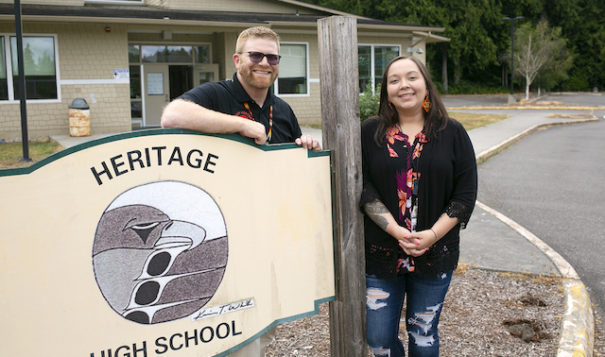 Heritage High Principal Dr. Nathan Plummer and Tulalip Education Division Executive Director Jessica Bulstad stand out front at Heritage High School on Thursday, Aug. 4, 2022, in Marysville, Washington. (Ryan Berry / The Herald)