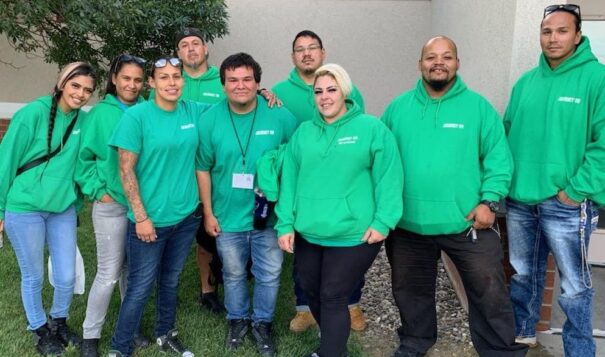 Journey On team members, all of them Indigenous and many of them experienced with homelessness themselves, work the streets of Rapid City wearing signature green apparel to forge personal connections with homeless people in the interest of public safety. (Photo courtesy of Journey On)