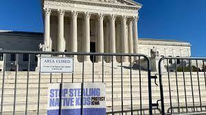 Indian Child Welfare Act (ICWA) sign outside the U.S. Supreme Court during Haaland v. Brackeen oral arguments in Washington, D.C., on Nov. 9, 2022. (Photo by ICT)