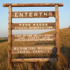 A sign entering Pine Ridge reservation. (Photo by Mary Annette Pember)