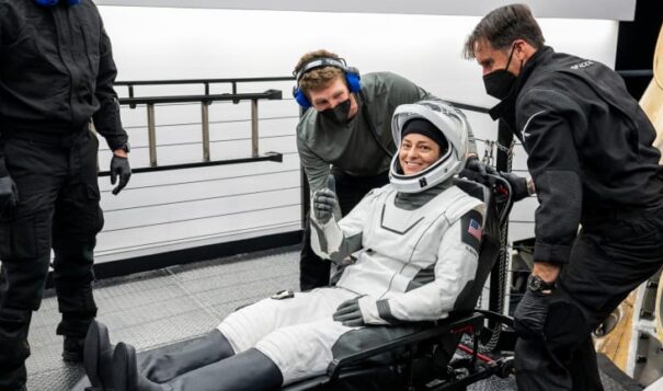 NASA astronaut Nicole Mann, Wailacki of Round Valley Tribes, taken out of the Dragon capsule on a stretcher as part of the recovery activities from space. SpaceX Crew-5 splashed down off the coast of Florida at 9:02 p.m. Eastern Time on March 11, 2023, after five months on the International Space Station. (Photo courtesy of NASA)