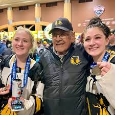 Kaiya, Grandpa Leslie, and Katierie Sandy after winning the 2023 state championship game in Minnesota. (Photo courtesy of Cindy Drost-Sandy)