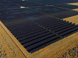 FILE - A solar farm sits in Mona, Utah, on Tuesday, Aug. 9, 2022. The U.S. Department of Agriculture announced a nearly $11 billion investment on Tuesday, May 16, 2023, to help bring affordable clean energy to rural communities throughout the country. (AP Photo/Rick Bowmer, File)