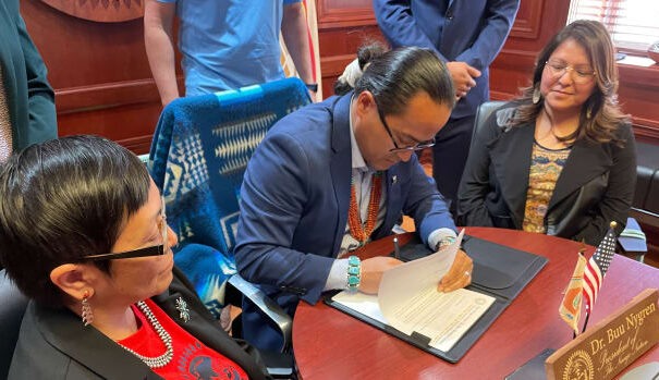 On May 5, 2023, Navajo Nation President Buu Van Nygren signs order that lifts the final COVID-19 mask mandates for schools, health care facilities and assisted-living facilities. (Pauly Denetclaw, ICT)