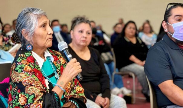 Pershlie Ami, a citizen of the Hopi tribe, shares her experience of attending Phoenix Indian School when she was a kid during the Road to Healing tour hosted by the U.S. Department of Interior at the Gila Crossing Community School on Jan. 20, 2023. Photo by Shondiin Silversmith | Arizona Mirror