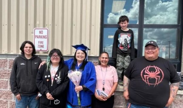 Dale Boushie stands with her family upon graduating from Blackfeet Community College's new BSN program. (Courtesy photo)