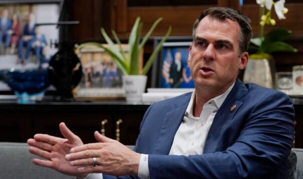 Oklahoma Gov. Kevin Stitt is pictured during an interview in his office Wednesday, Aug. 3, 2022, in Oklahoma City. The Oklahoma Board of Pardon and Parole has recommended clemency for death row inmate James Coddington. Stitt said that he hasn't been formally briefed on Coddington's case, but that with any clemency recommendation, he meets with prosecutors, defense attorneys and the victim's family before making a decision. (AP Photo, Sue Ogrocki)