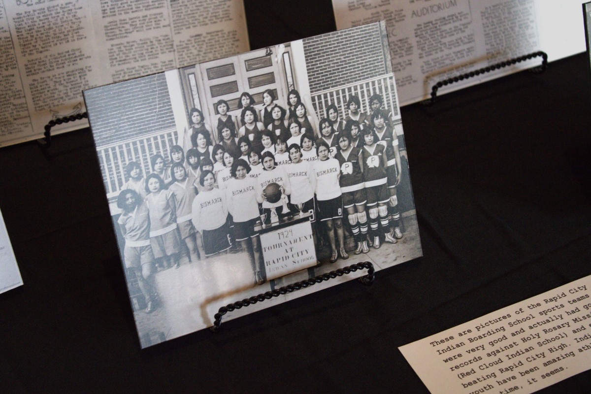 A photo of the Rapid City Indian School's women's basket ball team of 1929 is featured in the Remembering the Children Exhibit in downtown Rapid City. (Photo by Amelia Schafer, ICT/Rapid City Journal)