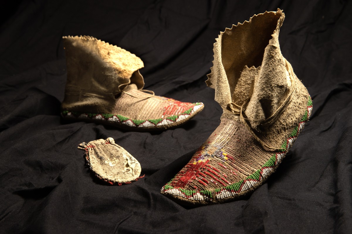 A pair of moccasins and a medicine pouch that were confiscated from a student at the Carlisle Indian Industrial School more than 100 years ago were repatriated to the Sisseton Wahpeton Oyate on Sept. 23, 2023.  They had been in the possession of a Pennsylvania family for more than a century before Kelley Bova, a tribal citizen, was asked to return them to the tribe. (Photo by Charles Fox for ICT)